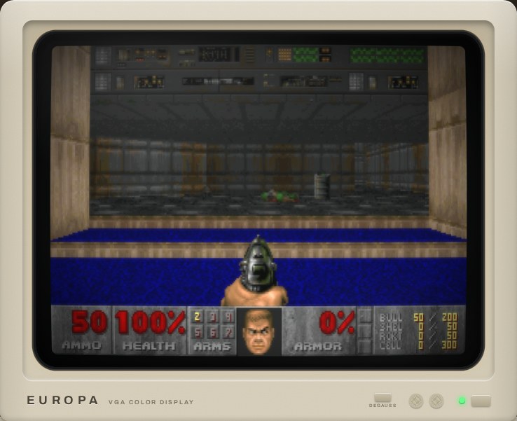 DOOM's first level on the colour monitor: the pistol raised over a pool of blue water, the status bar at the bottom.